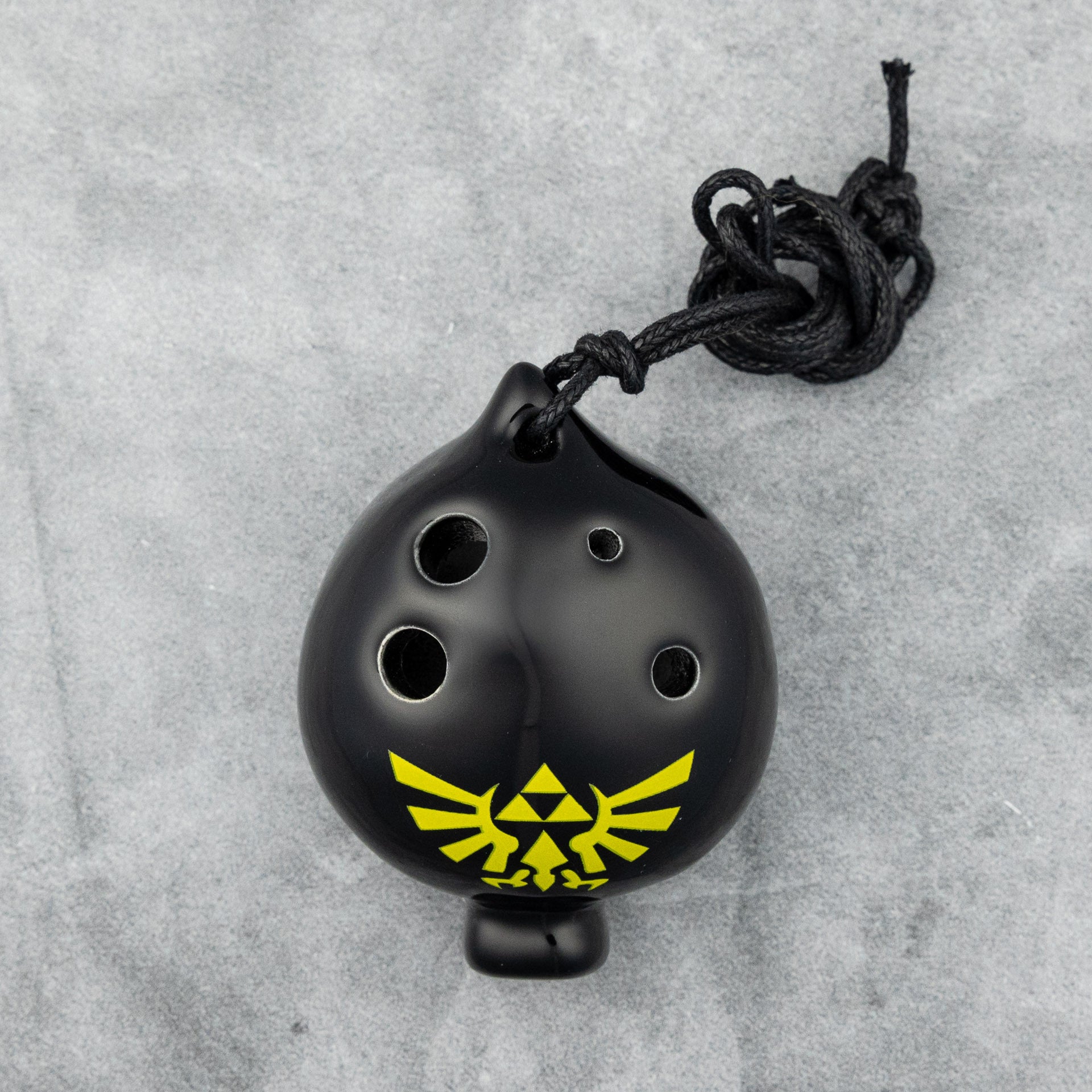 Songbird Black Spade 4-Hole Ocarina in G, Hylian Crest – Carlton