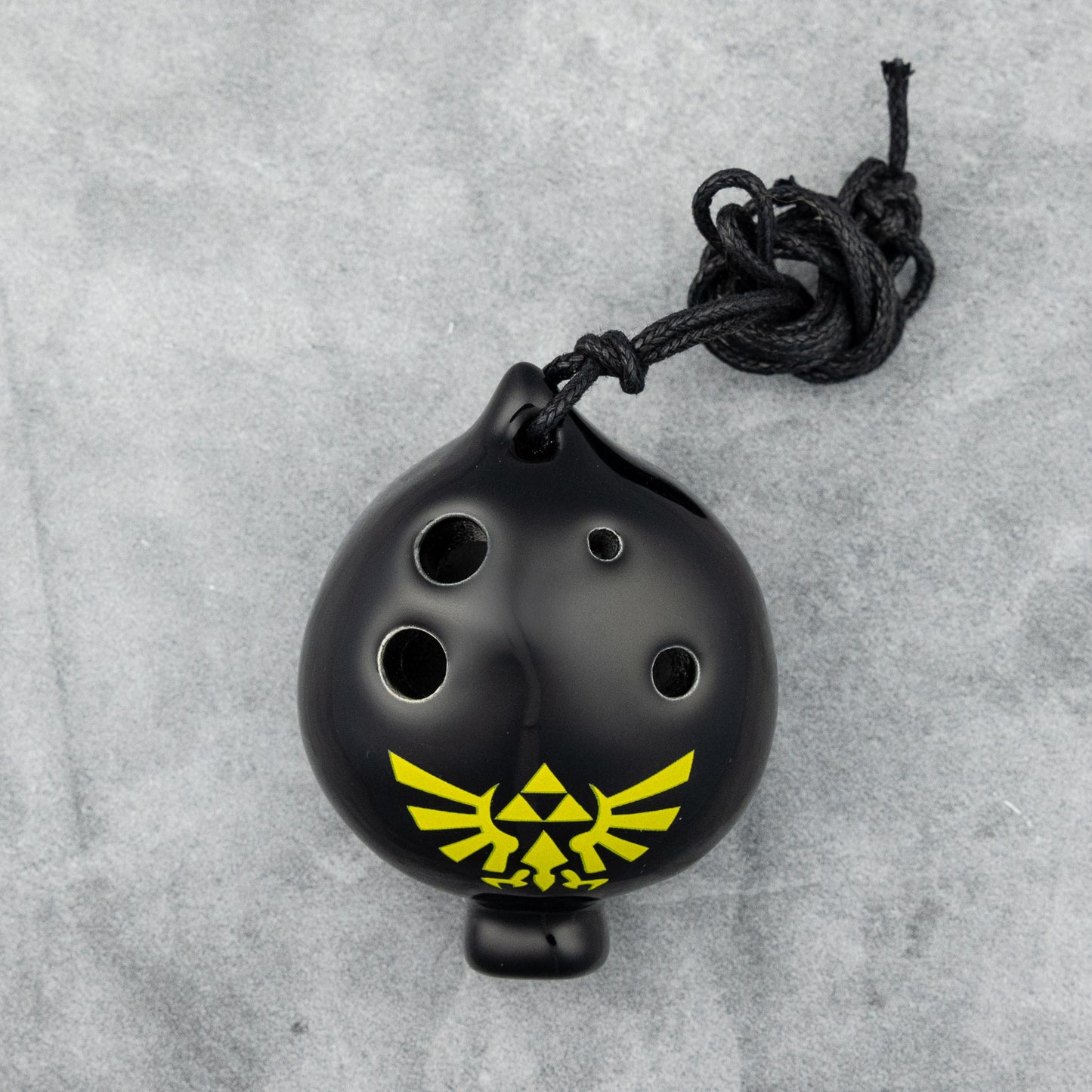 Songbird Black Spade 4-Hole Ocarina in G, Hylian Crest